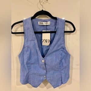 Zara size medium vest with back cinch. Fits more like a small